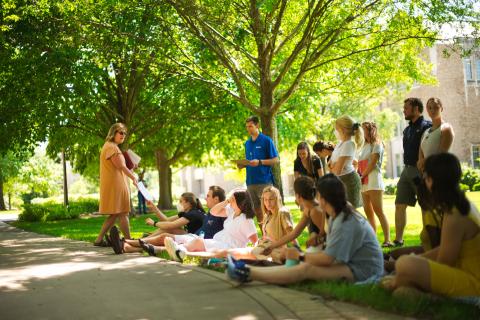 ACE teachers outside for a lesson