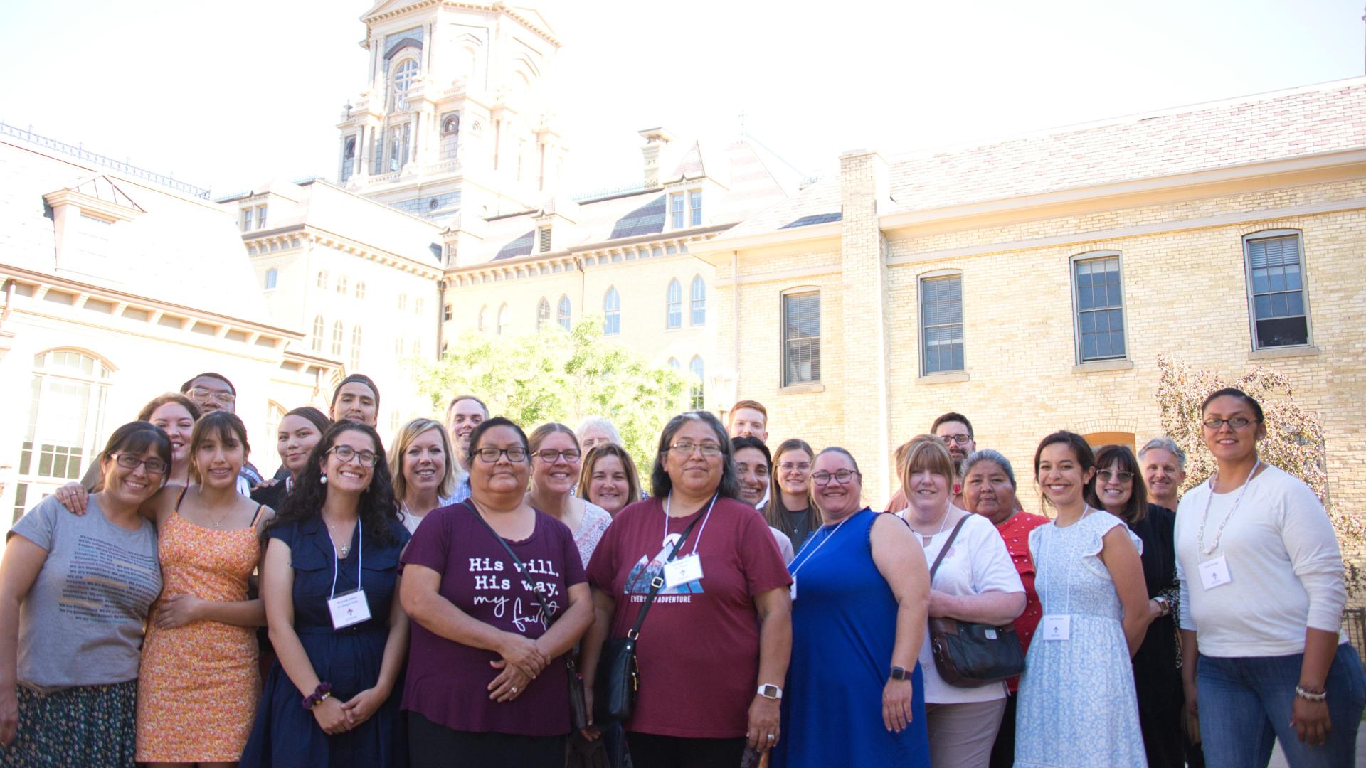 AICSN group photo with Dome in background